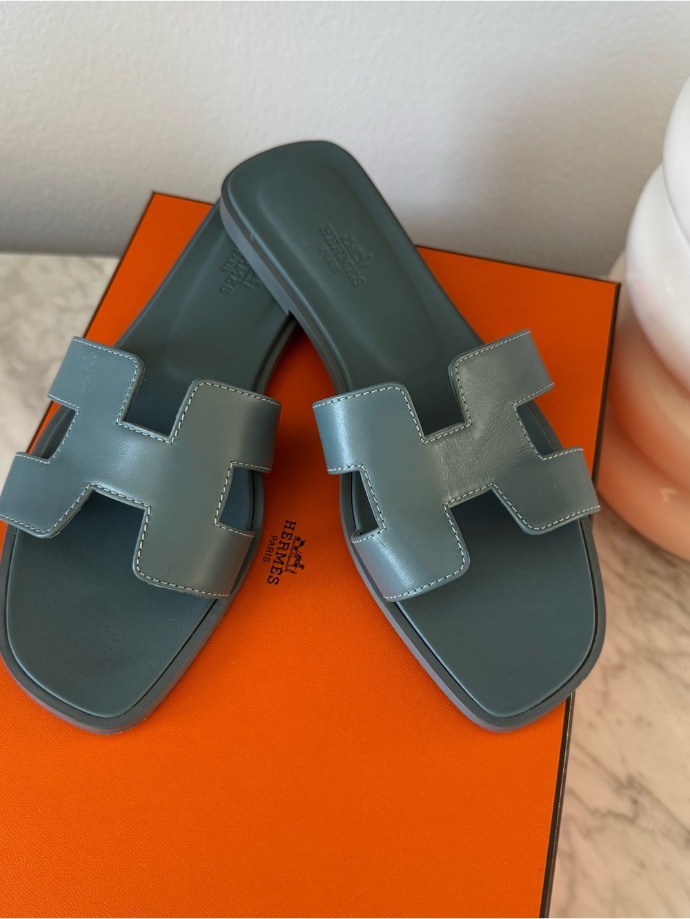 Hermes Women’s Oran Slide Sandals in Bleu Pinede